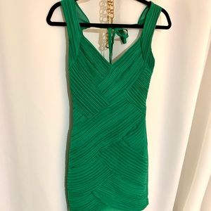Pleated green cocktail dress